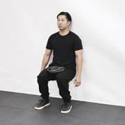 Weight Plate Wall Sit Demonstration