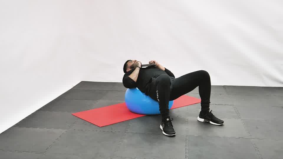 Stability Ball Weighted Sit-Up Demonstration