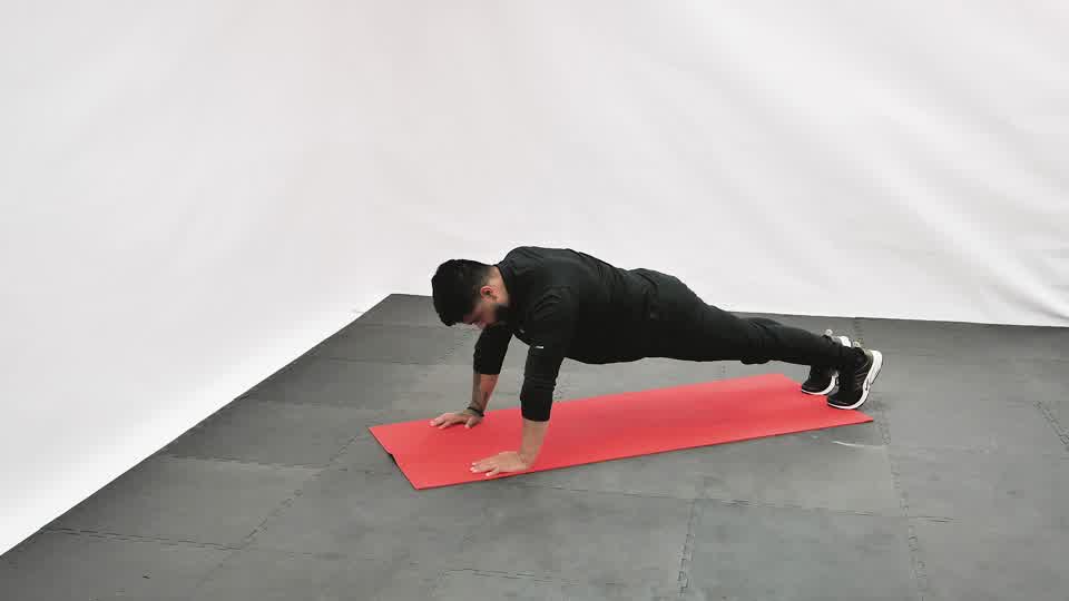 Plank with Alternating Knee Drive exercise